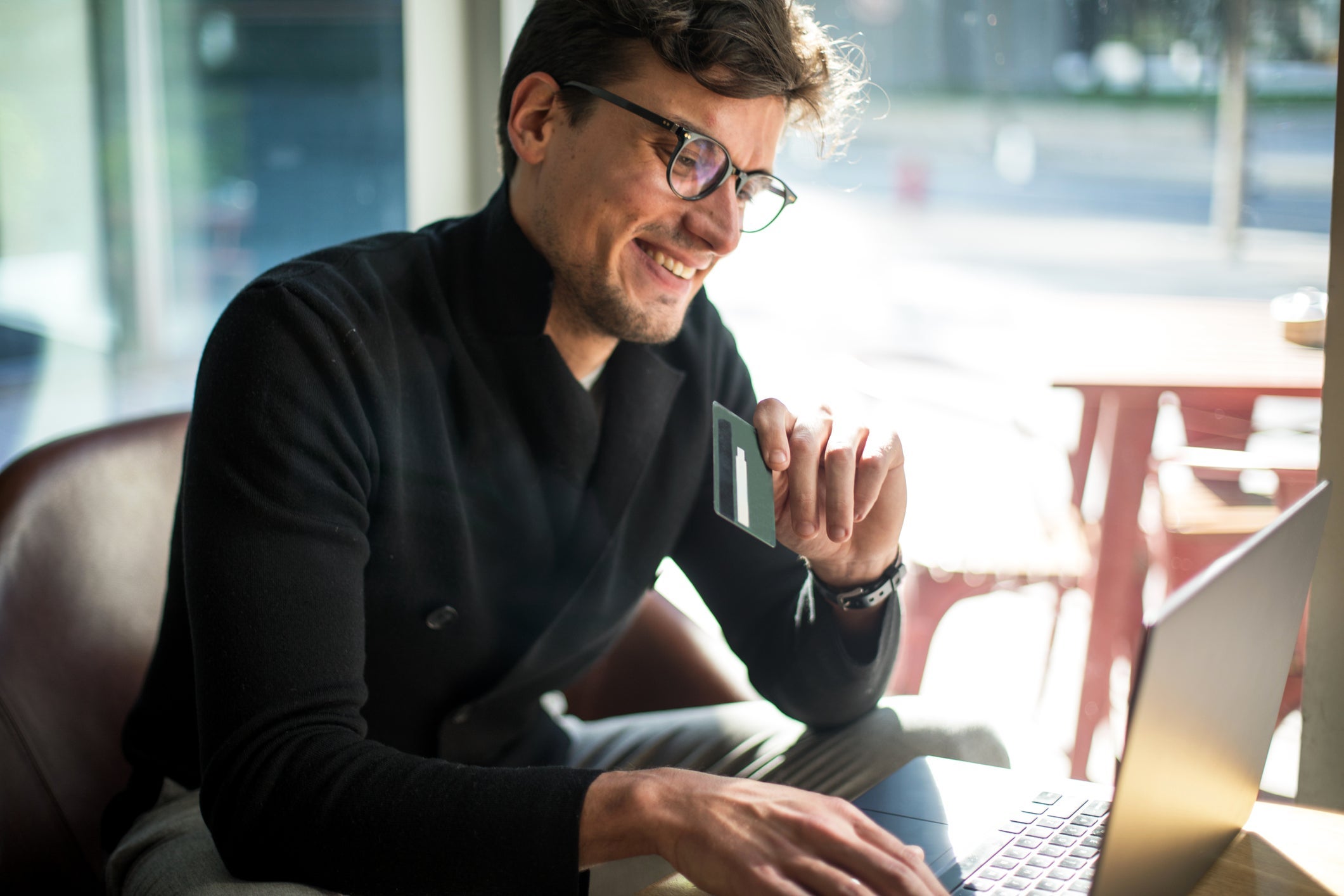 Smiling man shopping.